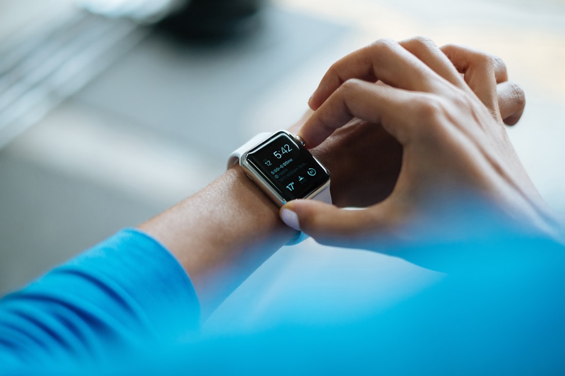 Athlete checking health metrics on an Apple Watch